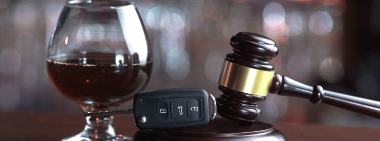 DWI Lawyer near syracuse ny image of alchol and gavel law case from karp law